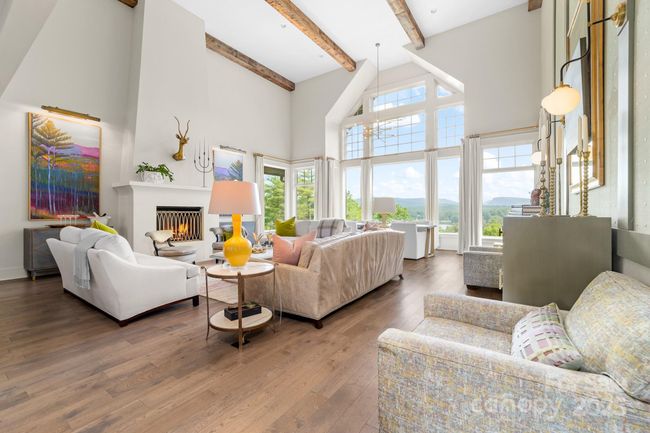 Foyer entryway leads you into the main living area. | Image 8