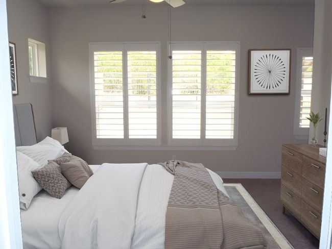 Carpeted bedroom with baseboards and ceiling fan | Image 23