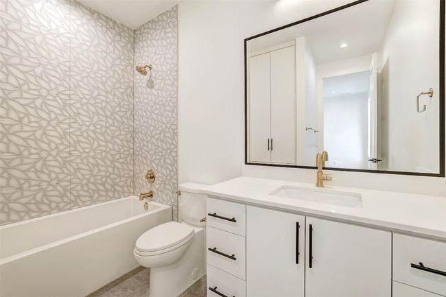 Bathroom with vanity, tub / shower combination, and recessed lighting | Image 12