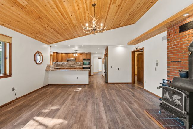Dining area with tongue & groove ceiling | Image 14