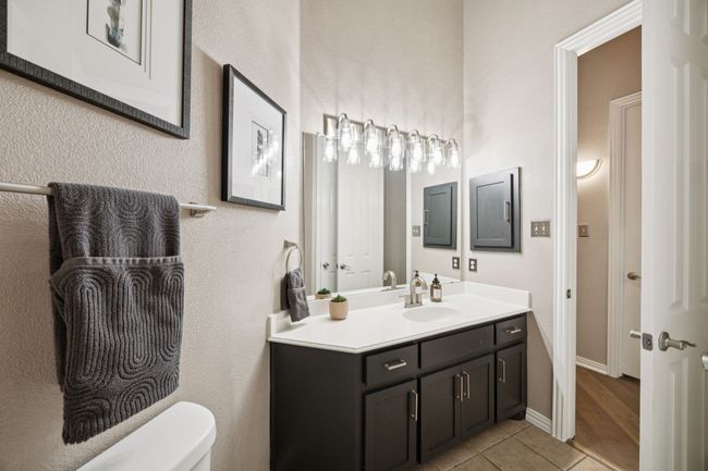 A second view reveals the thoughtful layout, with ample cabinetry, sleek hardware, and room for two to share without crowding—a true functional space for everyday living. | Image 27