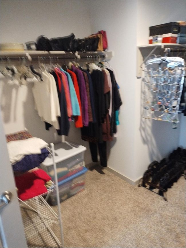 More space in primary closet. | Image 21