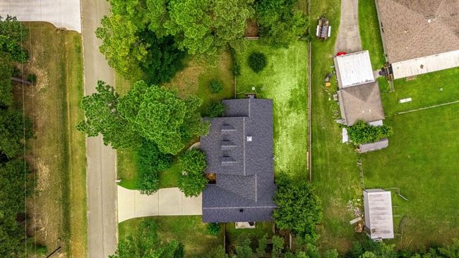 Aerial view of the home that demonstrates the new roof with transferrable warranty. | Image 37