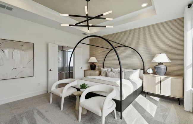 Elegant owner's suite with large windows *Photos of furnished model. Not actual home. Representative of floor plan. Some options and features may vary | Image 17