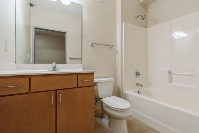 Three very large and nicely cared for bathrooms. (The photos are of unit 401. Owned by the same person and finishes that are VERY similar) | Image 18