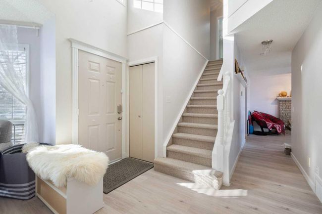 65 Scanlon Hill Nw, Home with 4 bedrooms, 3 bathrooms and 4 parking in Calgary AB | Image 2