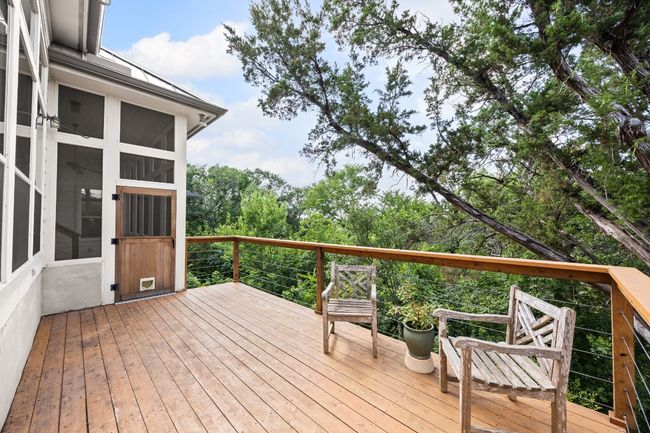 Large deck recently redone with steel cable for the railings. | Image 34