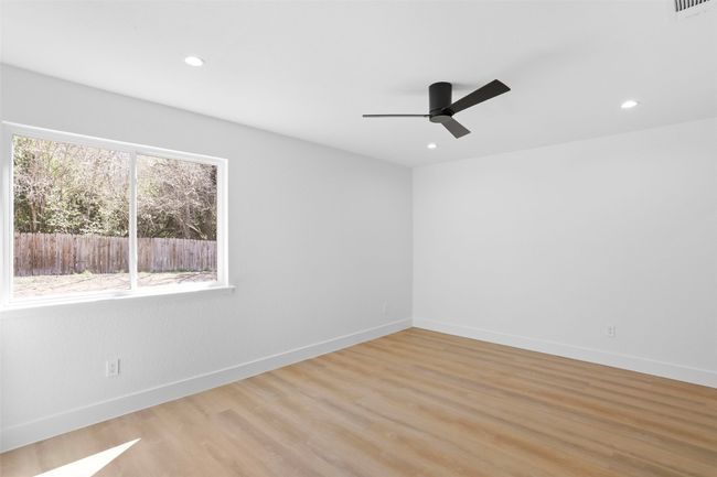 Large primary bedroom with tons of natural light | Image 21