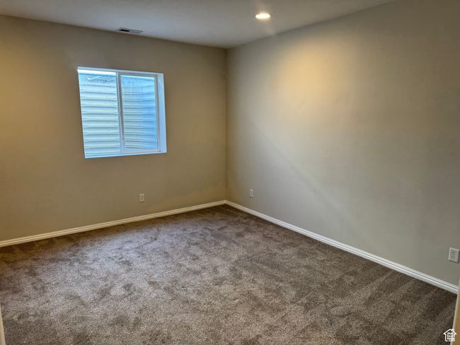 Spare room with dark carpet, baseboards, and recessed lighting | Image 22