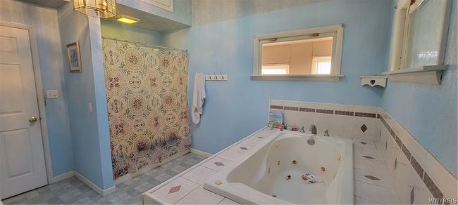 full bathroom with jet tub | Image 7