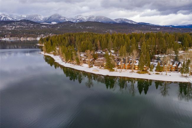 Aerial view featuring a wooded view and a water and mountain view | Image 5
