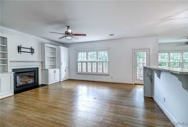 Open concept family room & kitchen spaces | Image 11