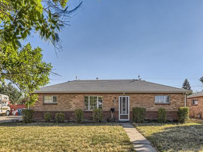 How adorable is the exterior of this all-brick ranch style home?! | Image 2