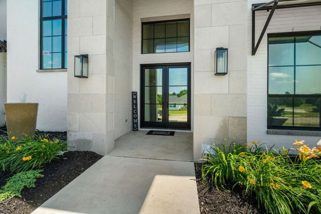Property entrance featuring french doors | Image 4