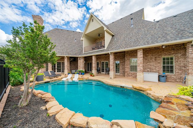 View of pool featuring a patio and ceiling fan | Image 32