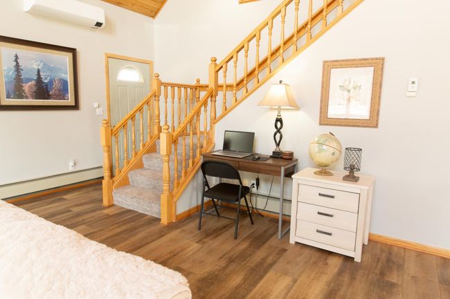 New carpeted stairs to primary suite | Image 15