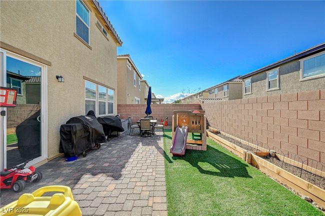 View of patio / terrace with grilling area and a playground | Image 53
