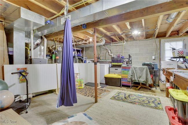 Basement featuring concrete block wall | Image 28