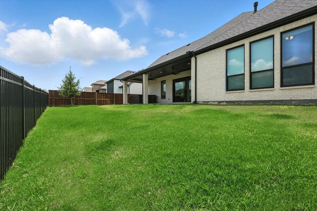 View of yard featuring ceiling fan | Image 36