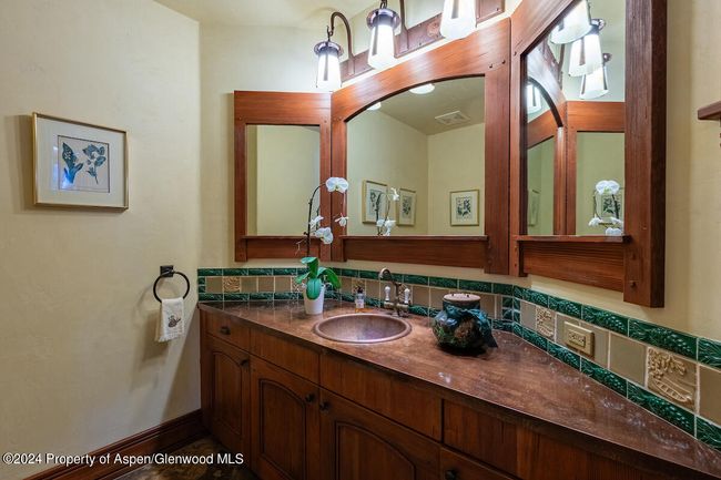 Featuring copper sink. | Image 26