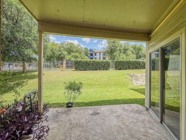 Fenced backyard featuring a patio | Image 27