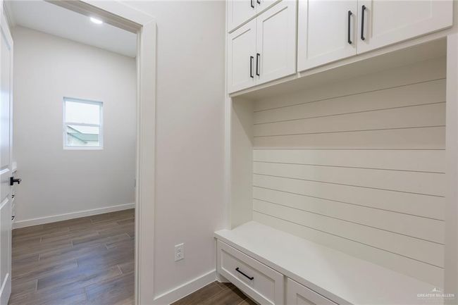 Mudroom featuring dark hardwood / wood-style flooring | Image 23