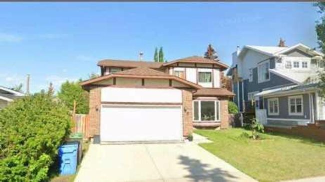 7 Hawksley Crescent Nw, Home with 4 bedrooms, 2 bathrooms and 4 parking in Calgary AB | Image 1