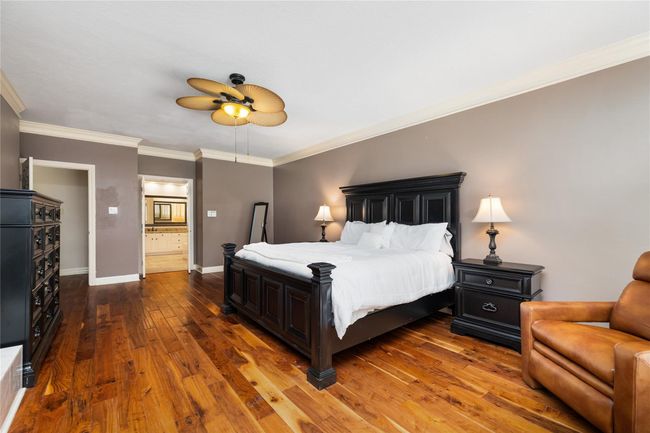 Whether you’re easing into your morning or retreating at day’s end, the primary suite offers comfort, space, and quiet luxury—your own corner of calm in the flow of everyday life. | Image 23