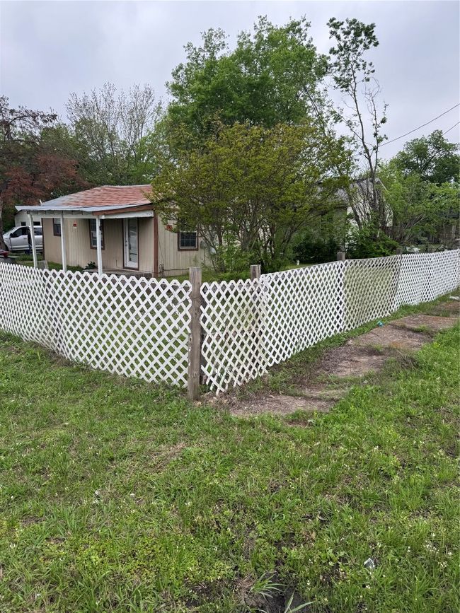 View of yard featuring fence | Image 8