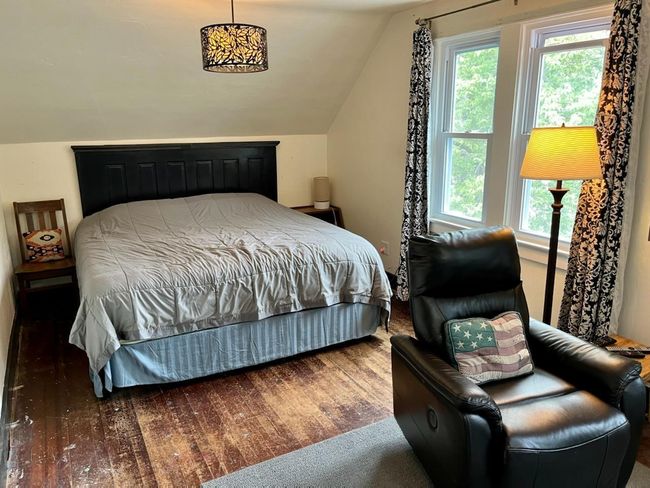 The main floor laundry is tucked into the corner of the kitchen. This home could be one level living plus so much more. | Image 17