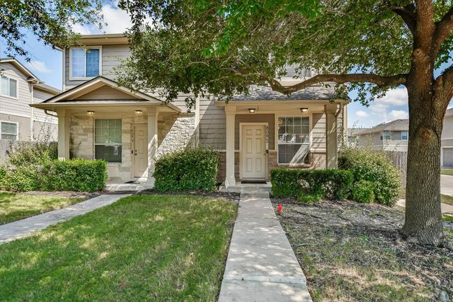View of front of property featuring stone siding and a front yard | Image 34
