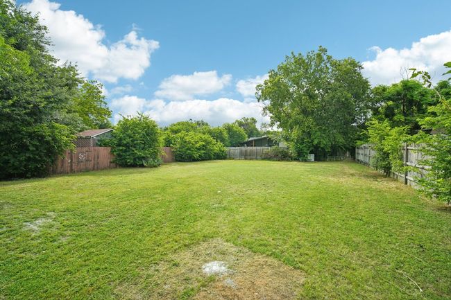 View of yard with a fenced backyard | Image 23