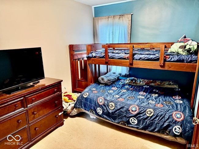 bedroom with carpet floors | Image 30