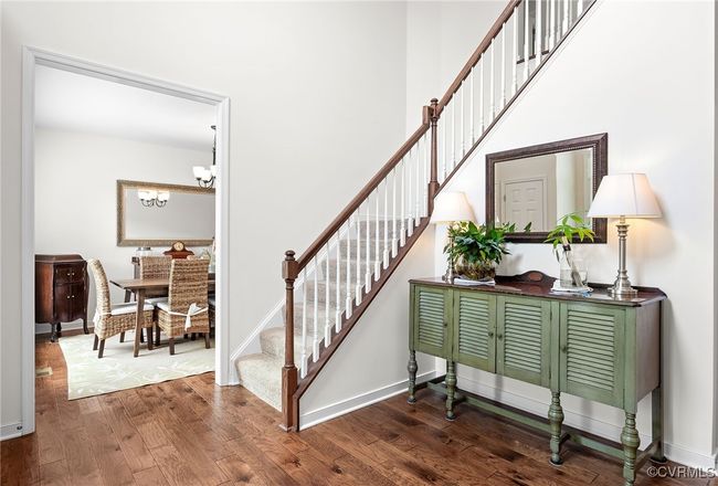 Turned open rail staircase and view into formal dining room | Image 5