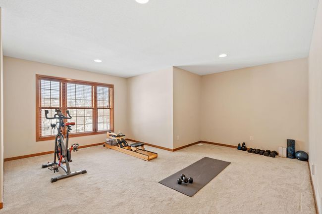Off the owner's suite is a private additional room, perfect for a second office or a personal gym space. | Image 37