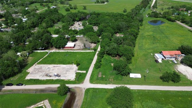 Birds eye view of property featuring a water view | Image 12