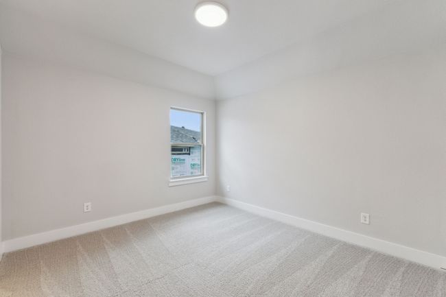 Carpeted empty room with baseboards | Image 21