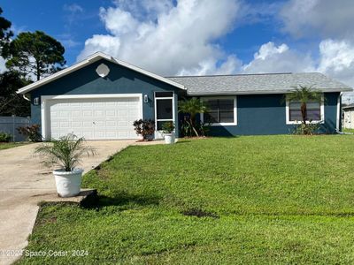 1938 Se Radcliff Avenue Se, House other with 3 bedrooms, 2 bathrooms and null parking in Palm Bay FL | Image 2