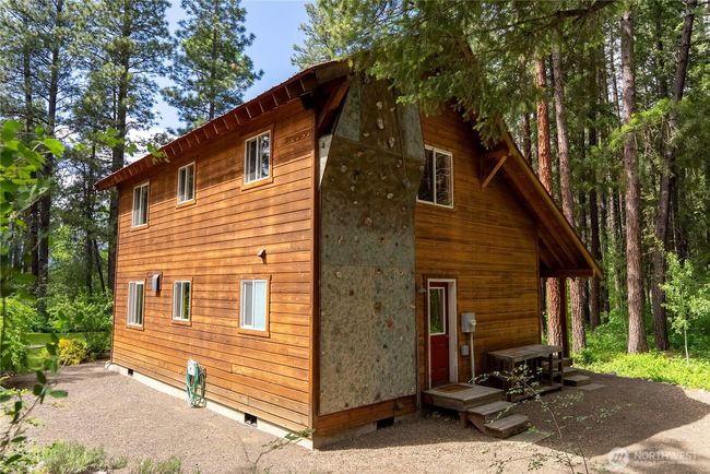 Unique custom-built climbing wall integrated into the home’s exterior—perfect for fitness enthusiasts and adventurous spirits | Image 36