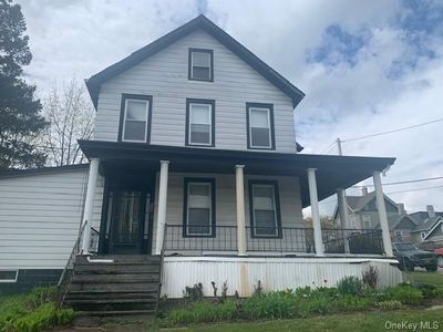 View of front of property featuring a porch | Image 1