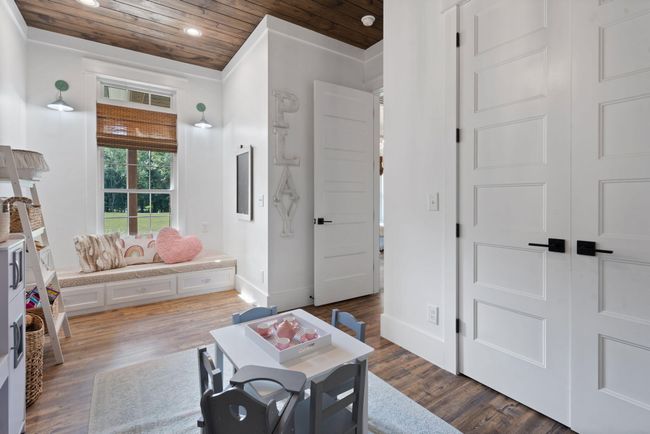 Built in drawer storage in the bench seating reading nook | Image 90