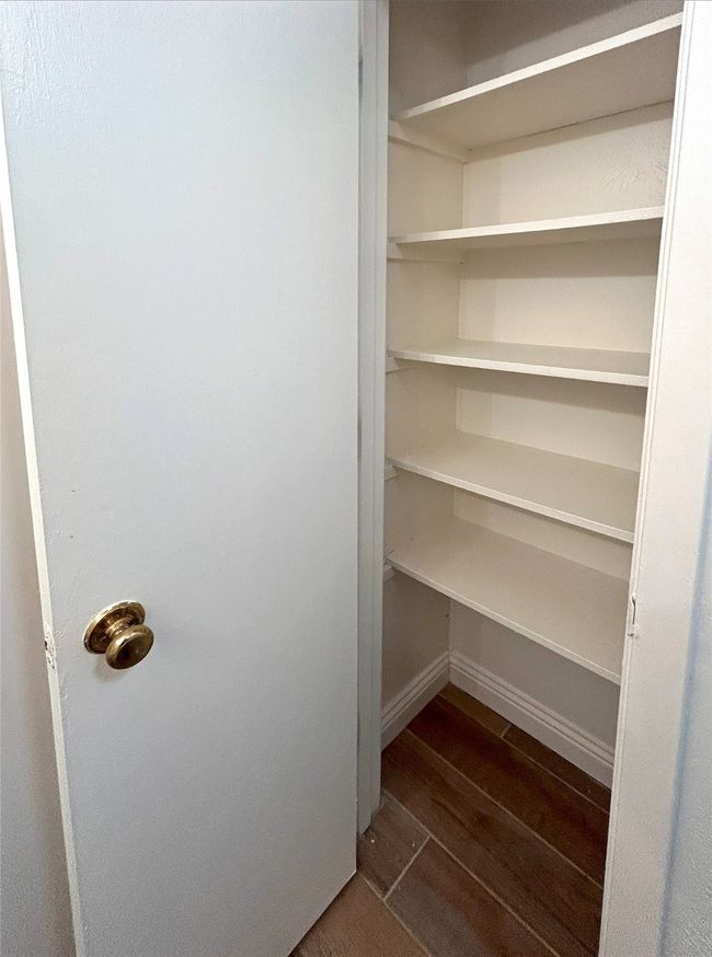 View of linen closet in primary bathroom | Image 24