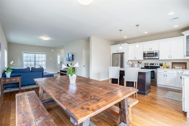 Dining room featuring recessed lighting, light wood-style floors, visible vents, and baseboards | Image 14