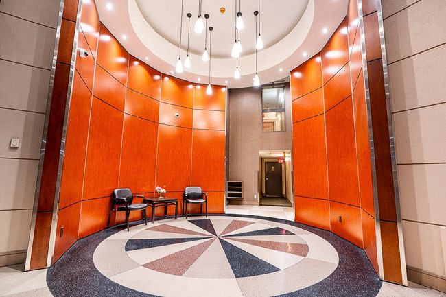 Common area with a high ceiling | Image 40