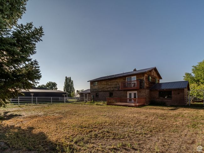 View of yard with fence | Image 5