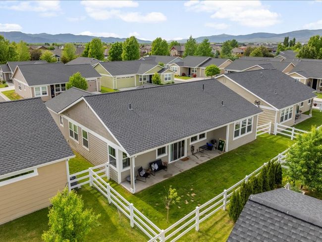 Aerial view of residential area with a mountain backdrop | Image 22