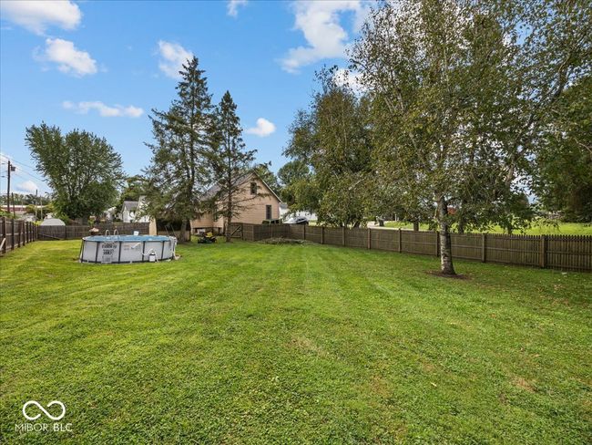 view of fenced backyard | Image 29