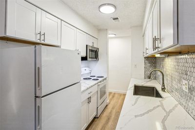 104 - 7755 E Quincy Avenue, Condo with 2 bedrooms, 2 bathrooms and 1 parking in Denver CO | Image 2