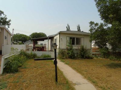 83 Poplar St, House detached with 3 bedrooms, 1 bathrooms and 4 parking in Drumheller AB | Image 1