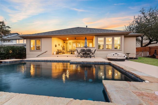 Backyard Oasis with Sparkling Pool, Pergola, and Outdoor Kitchen | Image 31